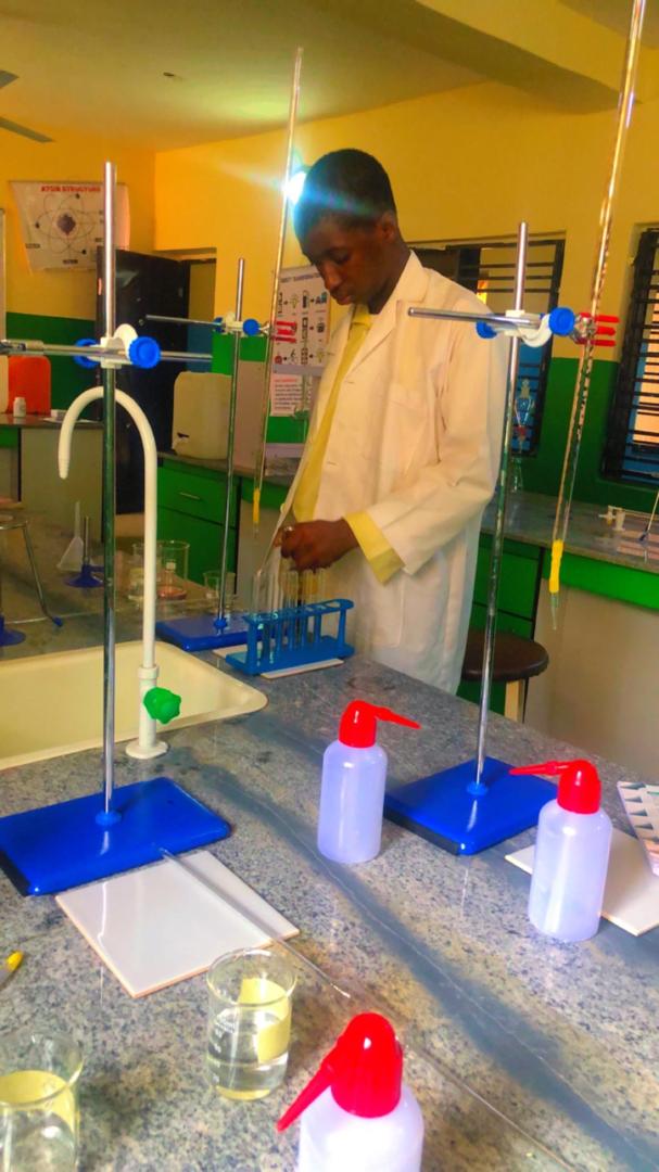A student carrying out a titration in the ACES chemistry laboratory